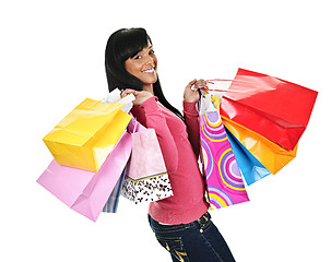 Image showing Happy young black woman with shopping bags