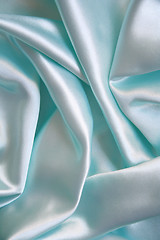 Image showing Smooth elegant blue silk as background 