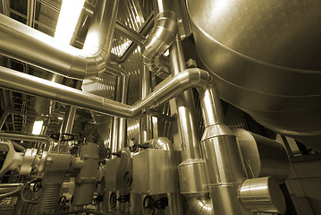 Image showing Equipment, cables and piping as found inside of a modern industr