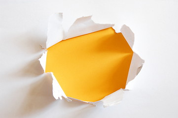 Image showing yellow hole in paper