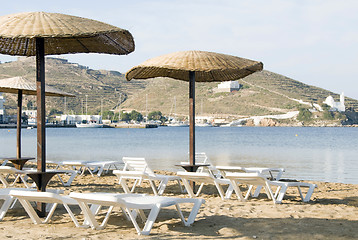 Image showing beach with umbrellas lounge chairs Ios Island Cyclades Greece