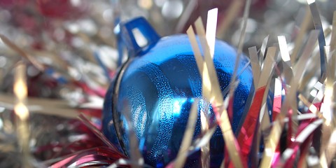 Image showing Christmas bauble and tinsel