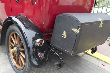 Image showing  Boot of a  red vintge car.