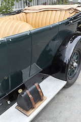 Image showing Green vintage car with gas tank on the running board.