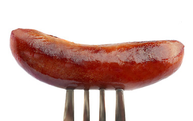 Image showing Sausage on fork