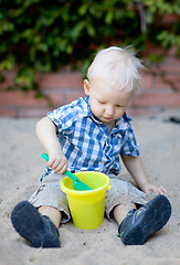 Image showing toddler playing in sandbox