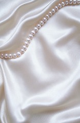 Image showing Smooth elegant white silk with pearls as wedding background