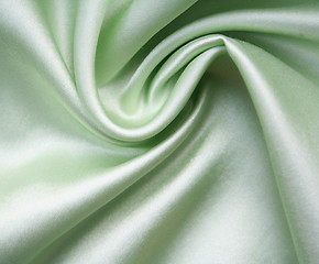 Image showing Smooth elegant green silk as background