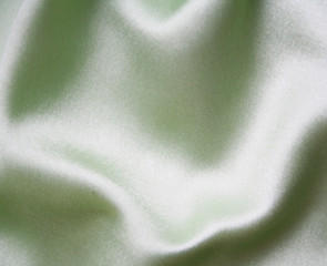 Image showing Smooth elegant green silk as background