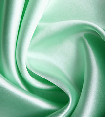 Image showing Smooth elegant green silk as background