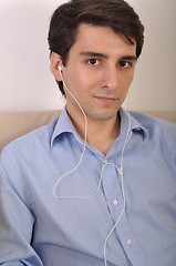 Image showing Man listening to music