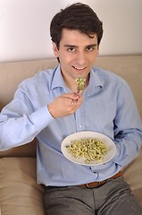 Image showing Man having lunch