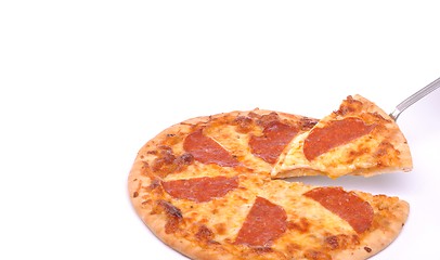 Image showing Serving pepperoni pizza