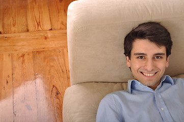 Image showing Man relaxing on the couch