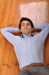 Image showing Man lying on the floor