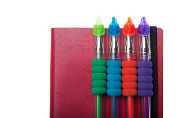 Image showing Notebook and pens