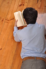 Image showing Man reading a book