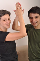 Image showing Sister and brother high five