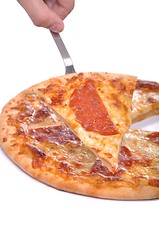 Image showing Serving pepperoni pizza