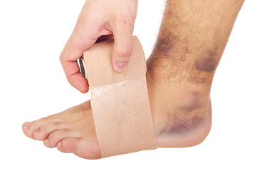 Image showing Bandaging a sprained ankle