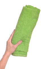 Image showing Hand holding beach towel
