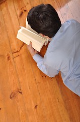 Image showing Man reading a book