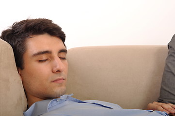 Image showing Man sleeping on the couch