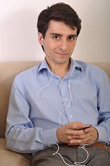 Image showing Man listening to music