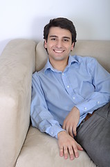 Image showing Man relaxing on the couch