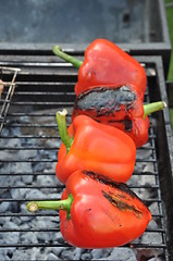 Image showing Grilling red peppers