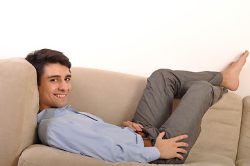 Image showing Man relaxing on the couch