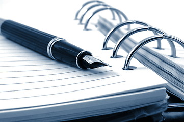 Image showing business organizer and pen