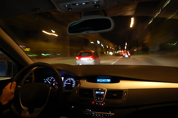 Image showing night drive with car in motion 