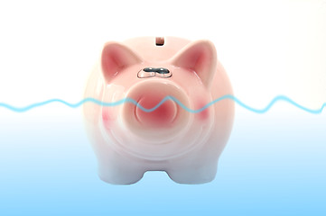 Image showing piggy bank swimming in water