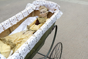 Image showing Doll in a pram.