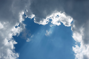 Image showing Dense clouds formed the arch