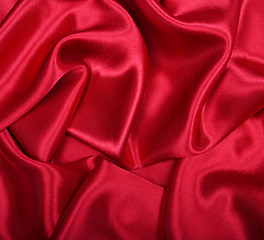 Image showing Smooth elegant red silk as background 