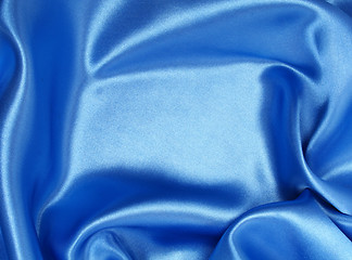 Image showing Smooth elegant blue silk as background 