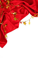 Image showing Smooth Red Silk with golden stars as holiday background 