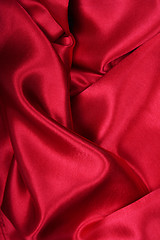 Image showing Smooth elegant red silk as background 