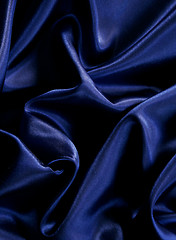 Image showing Smooth elegant dark blue silk as background 