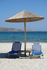 Image showing Greece. Kos island. Two chairs and umbrella on the beach