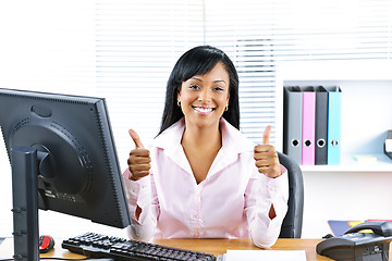 Image showing Businesswoman giving thumbs up