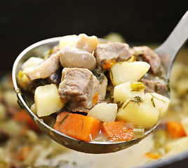 Image showing Beef stew in serving spoon