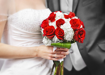 Image showing Bride and groom with bridal bouquet