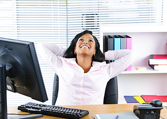 Image showing Black businesswoman resting at desk