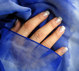 Image showing hand on silk