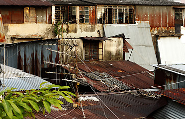 Image showing old rusty metal housing at day 