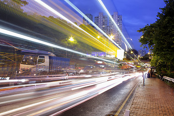 Image showing Fast moving cars at night 