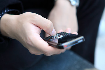 Image showing Mobile phone in man hand 